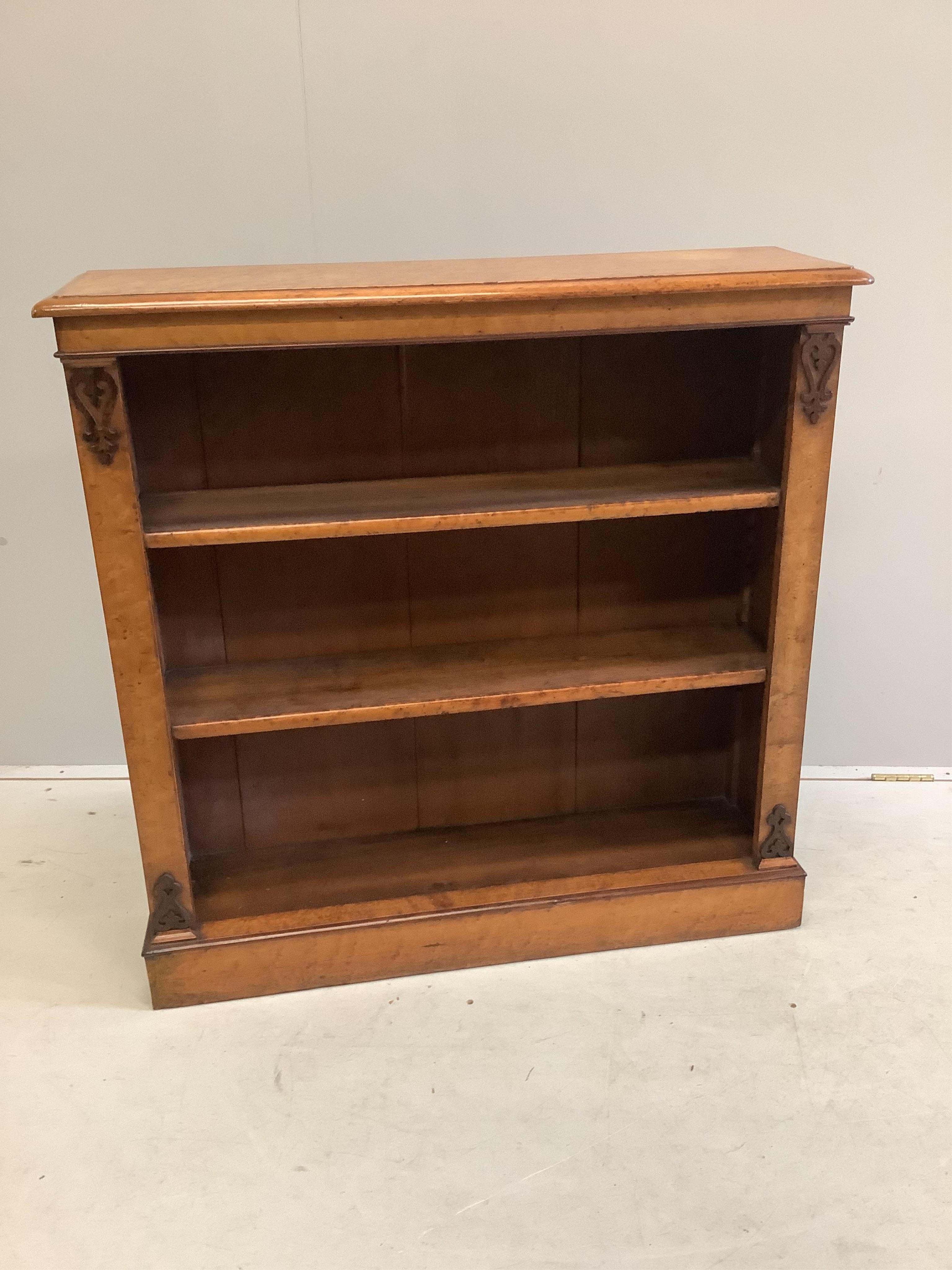 A Victorian bird's eye maple open bookcase, width 95cm, depth 27cm, height 94cm. Condition - good